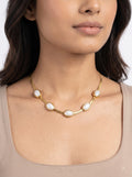Pearl accent chain necklace worn by model