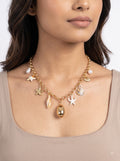 Coastal charm pendant necklace worn by model