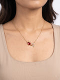 Leaf accent pendant necklace worn by model